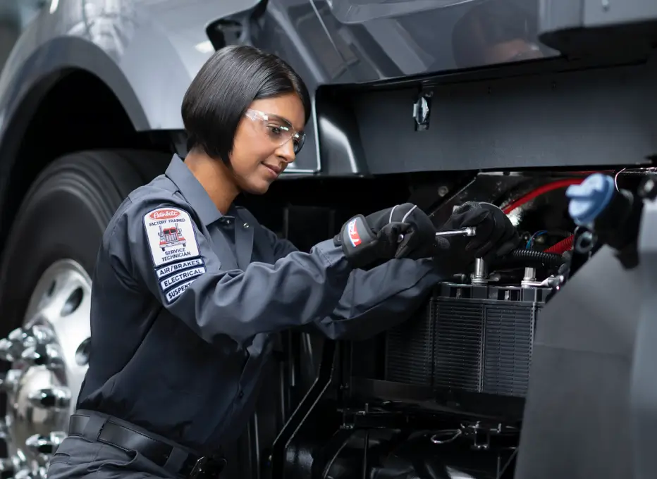 Technician Replacing Battery